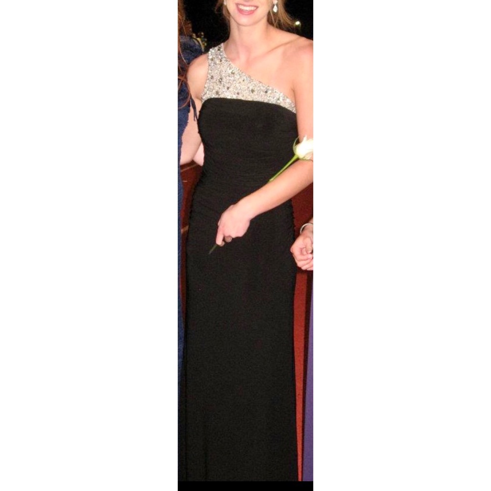 Black beaded one-shoulder formal dress.